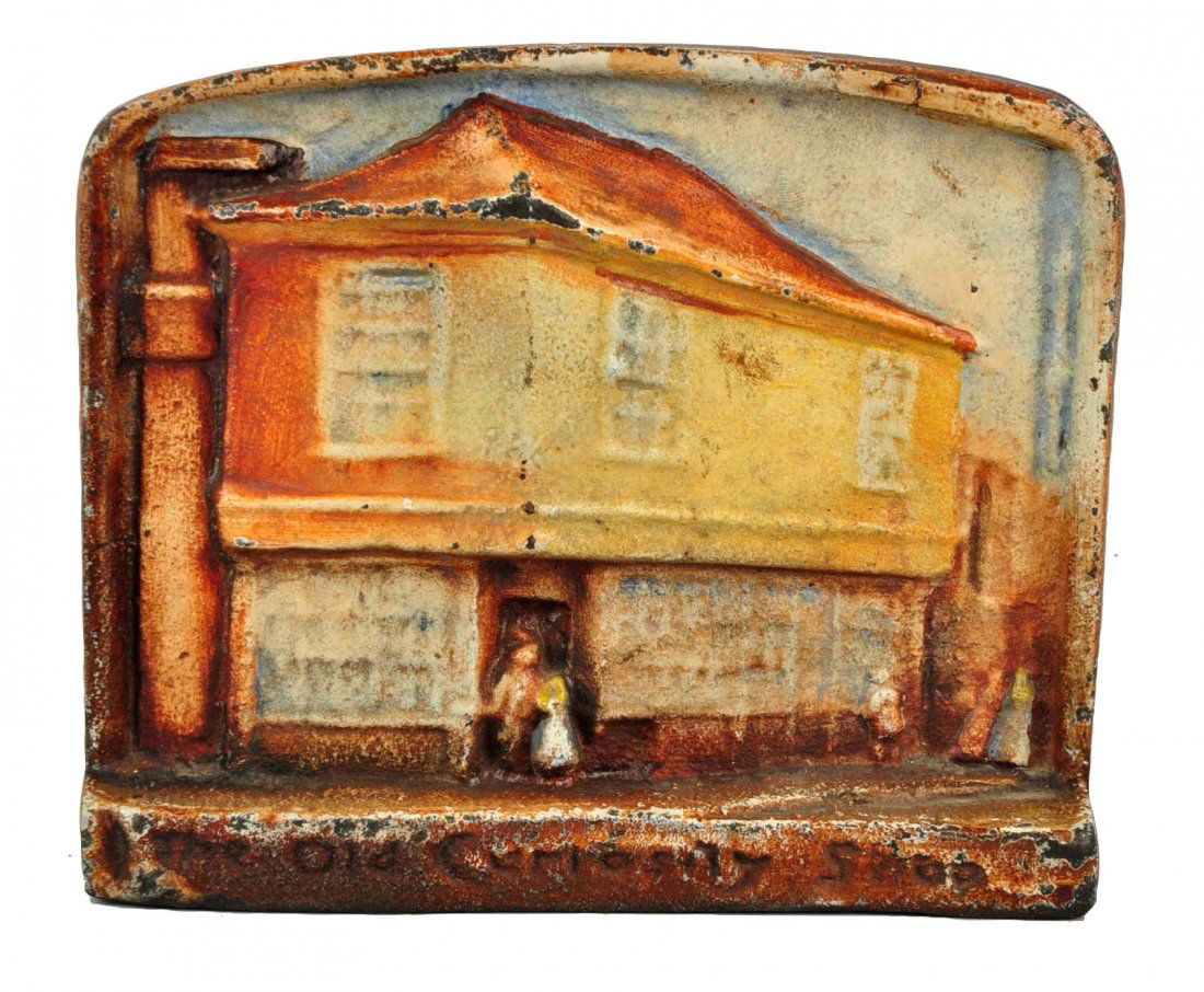 Cast Iron Old Curiosity Shop Wedge Doorstop. (1 of 3)
