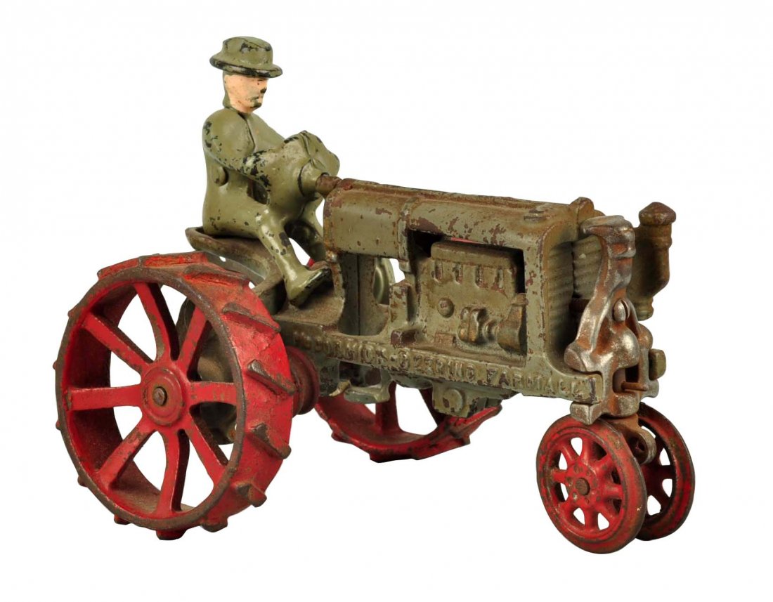Arcade McCormick-Deering Cast Iron Tractor. (1 of 5)