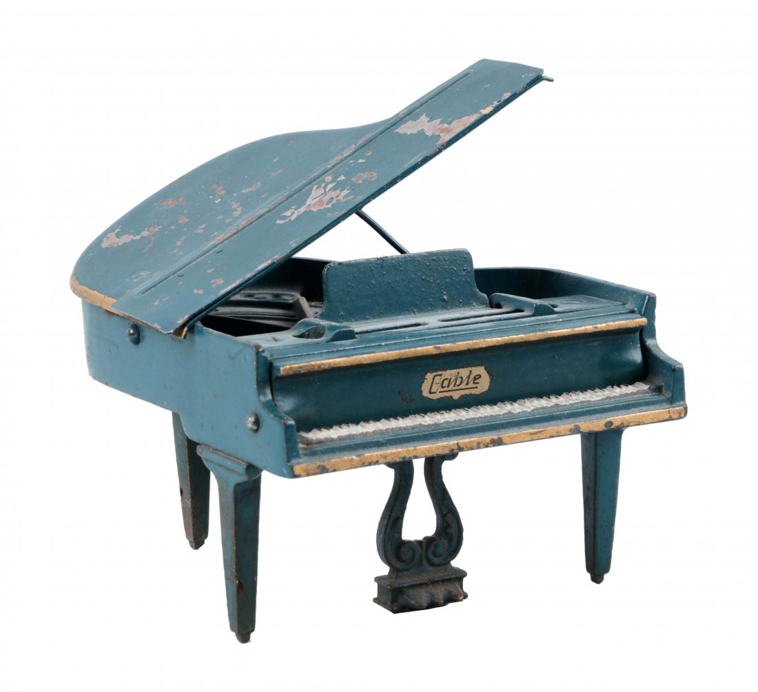 Arcade Cast Iron Cable Piano. (1 of 2)
