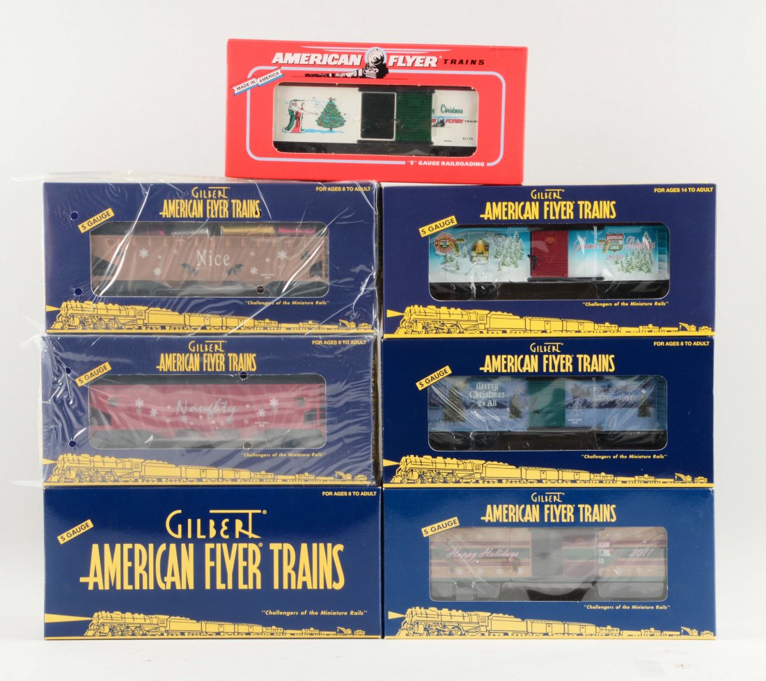 Lot of 5: American Flyer Christmas Freight Cars.: Includes: No. 48394 2011 Holiday Boxcar, No. 48384 2010 Holiday Boxcar, No. 48368 2007 Holiday Boxcar, No. 48325 1996 Holiday Boxcar, No. 48623 Naughty and Nice Hopper 2 pack. All are like new in the 