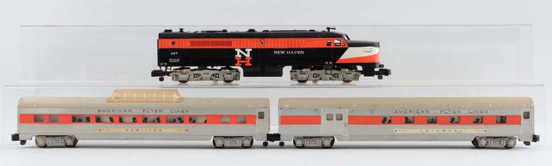 American Flyer 497 Alco New Haven & Passenger Cars.: Includes complete and all original locomotive, 962 orange stripe Hamilton vistadome car, and 960 orange stripe combo car. Needs cleaning. Scratches and wear throughout.