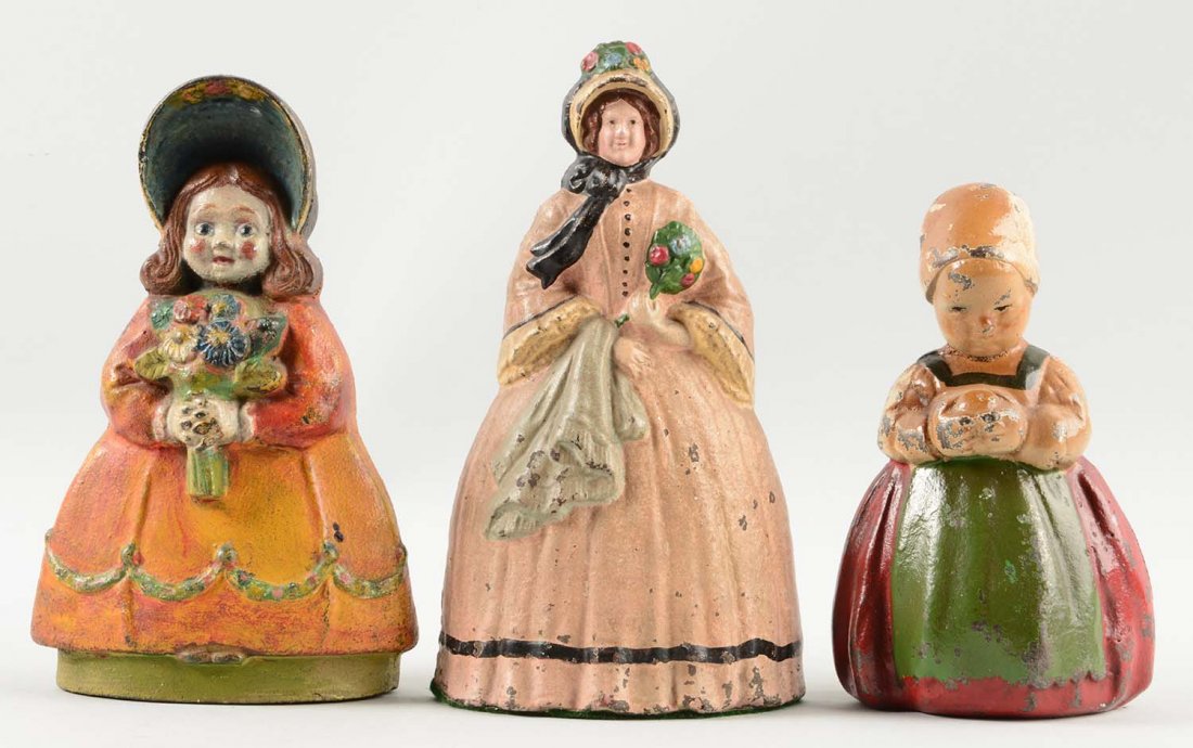 Lot of 3: Cast Iron Assorted Lady Doorstops. (1 of 1)