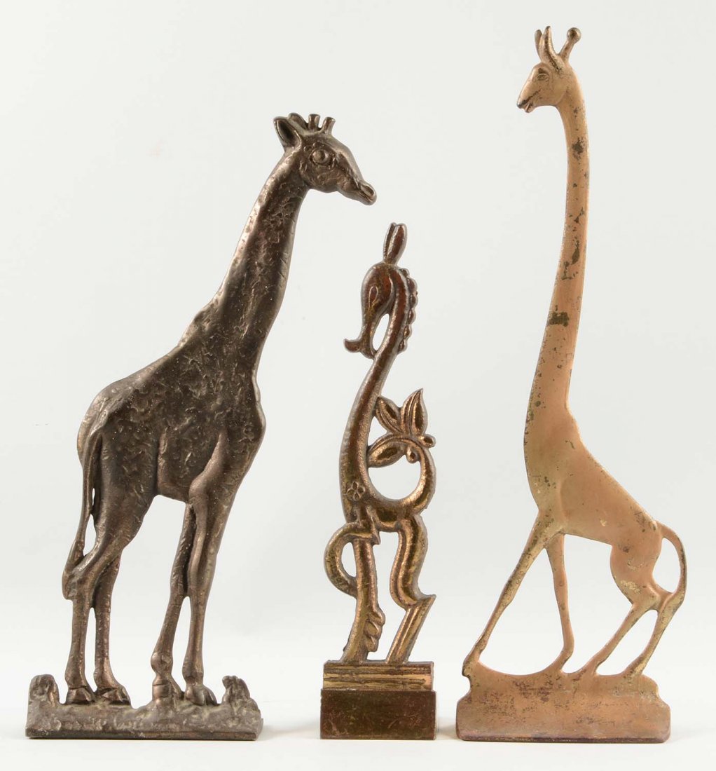 Lot of 3: Cast Iron Giraffe Doorstops. (1 of 1)
