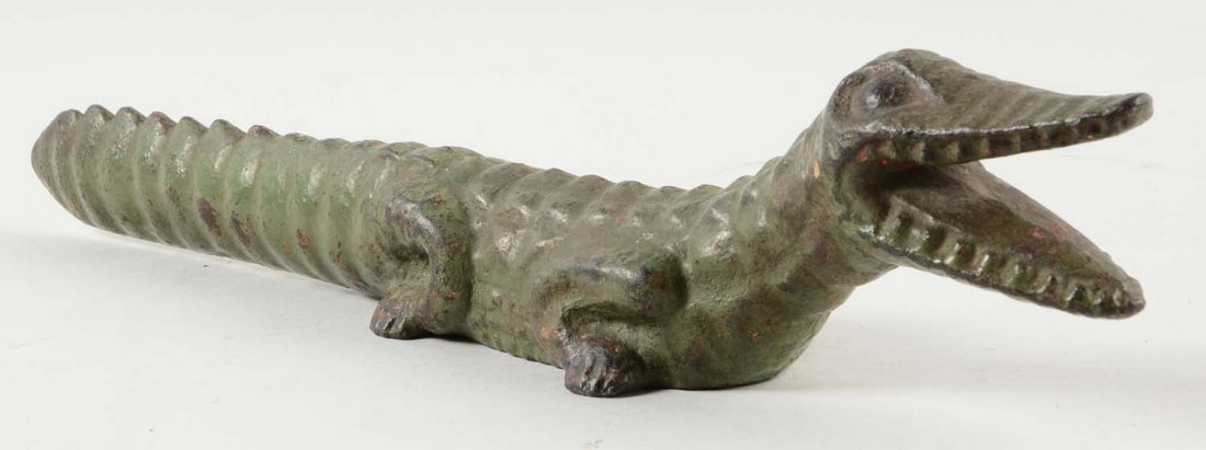 Cast Iron Crocodile Doorstop.: Rare form with mouth open showing teeth. Full-figure, solid casting.