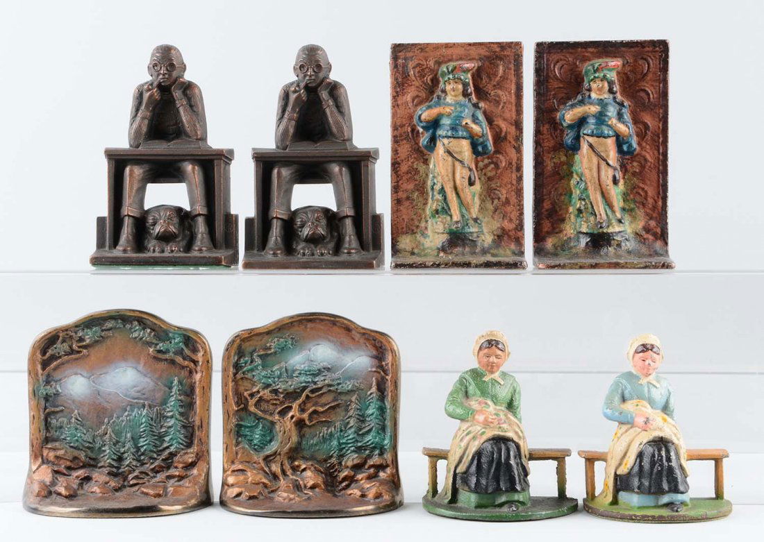 Lot of 4 pairs: Cast Iron Assorted Bookends. (1 of 1)