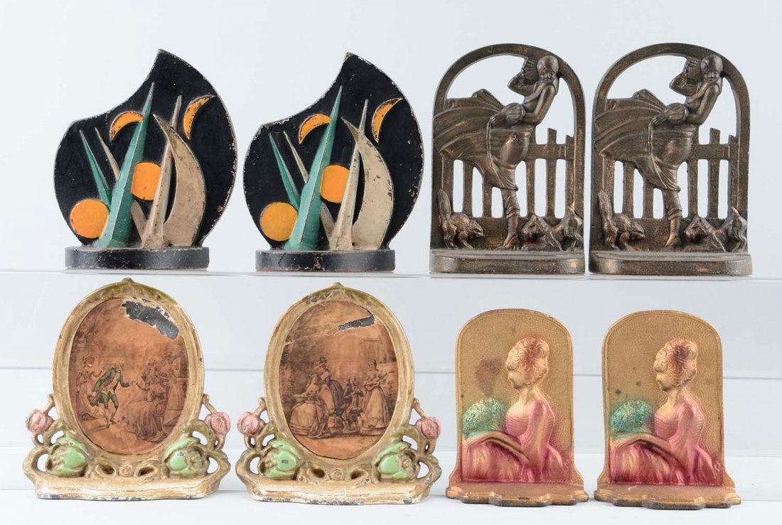 Lot of 4 pairs: Cast Iron Assorted Bookends. (1 of 1)