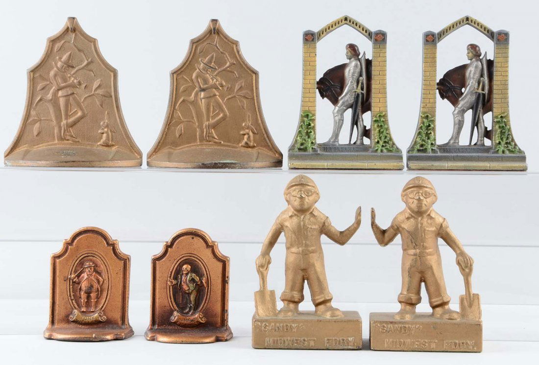 Lot of 4 pairs: Cast Iron Assorted Figural Bookends. (1 of 1)