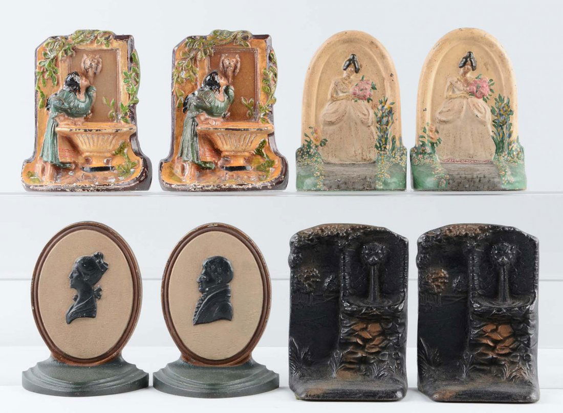 Lot of 4 pairs: Cast Iron Assorted Bookends. (1 of 1)