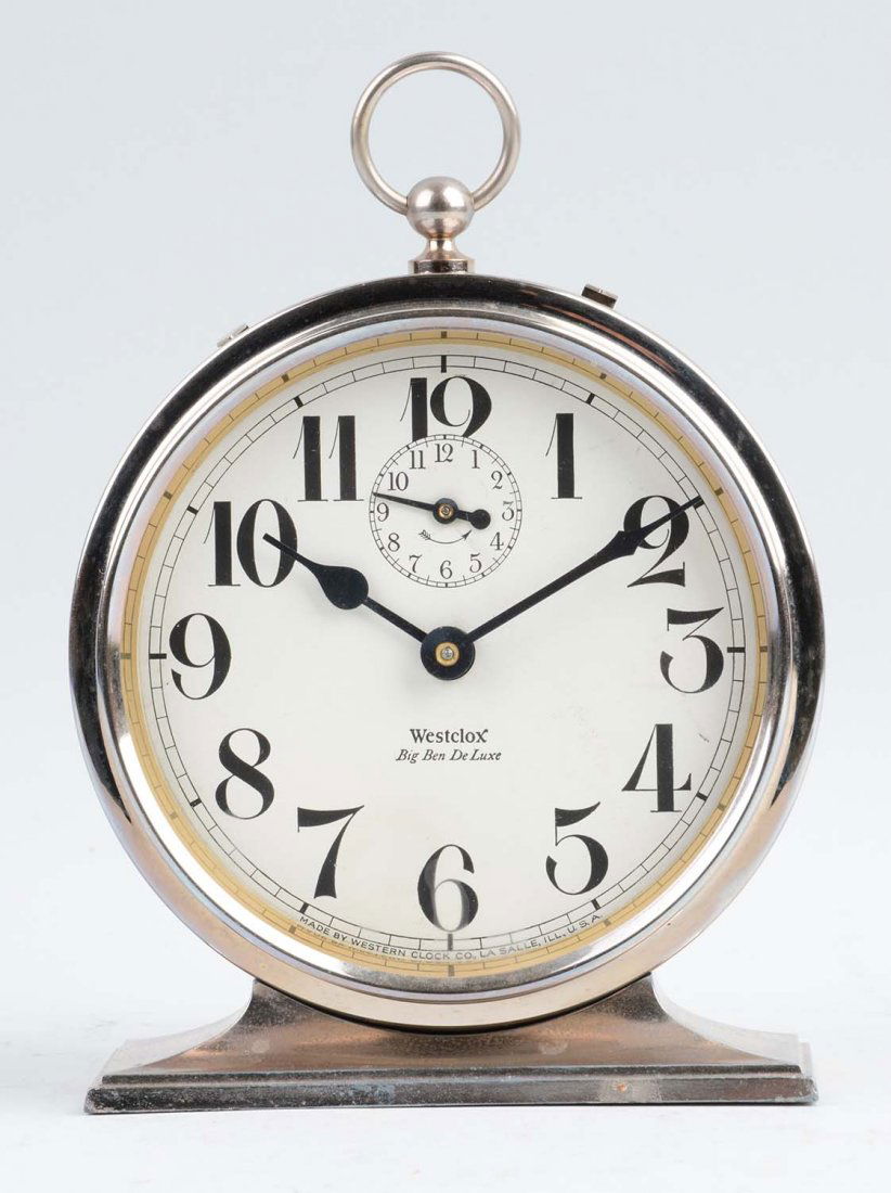 Westclox "Big Ben" Alarm Clock.: This lot is of a Westclox "Big Ben" alarm clock. This clock has a white face with black numbers, along with a second face. Tarnishing and scratches are present on the silver colored metal body.