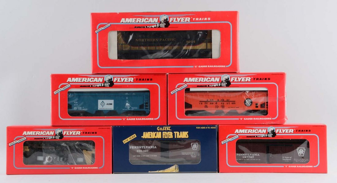 Lot Of 6: American Flyer Norther Pacific Freight Set.: Includes: No. 48014 GP9, PRR Boxcar, No. 52094 NASG 1996 Hopper Car, No. 48330 PRR Boxcar, No. 48612 ADM Three Bay Hopper Car and No. 48711 Caboose. All are like new in the original boxes.