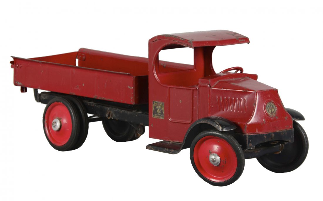 Little Jim Playthings Mack Dump Truck: This vintage dump truck is in original condition with some paint chipping and a nice patina. It also retains the original Mack decal. (Excellent). 26"L