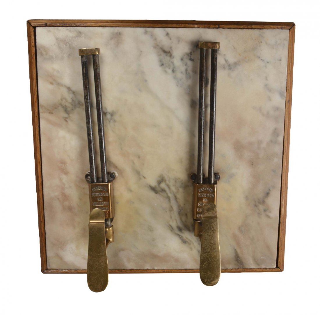 Shoe Shine Platform With Antique Wrought Iron And Wood: This low platform is constructed from oak and marble. The brass shoe rests were manufactured by Safety Shoe Rest Co. of Chicago. Charcoal grey painted wrought iron chair with oak wood seat and arm res