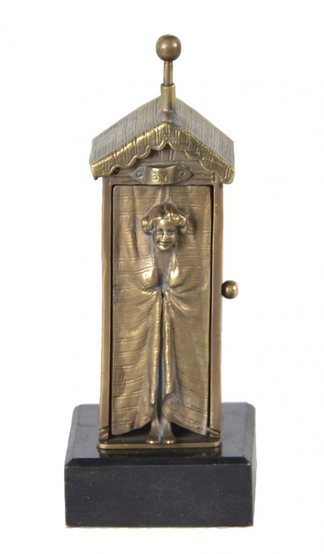 Franz Bergman Erotic Bronze Figure: Circa the late 19th century, this figure shows a nude woman peeking out from the curtains of a dressing room. Pressing the knob on top rotates the woman to reveal her posterior end. The back of this f