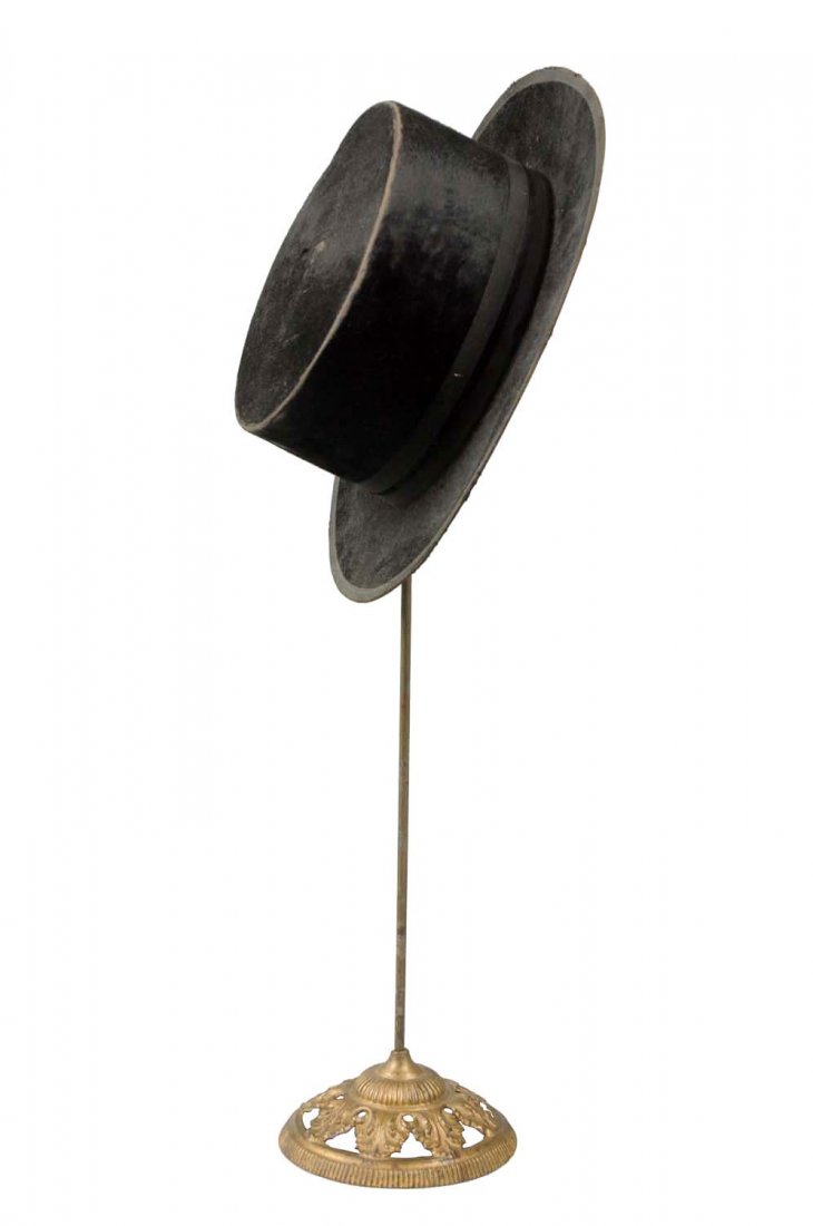 Cast Iron Hat Display with Hat. (1 of 4)