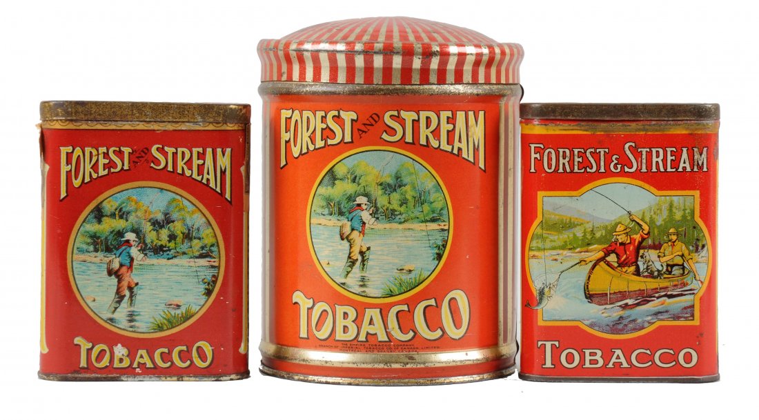 Lot of 3 Forrest & Stream Tobacco Tin.: This is a nice lot of three hard to find tins. The round tin has a some scrapes to the lid but a very clean can. The pocket tin with the men in the canoe has clean graphics with oxidation to the lid a