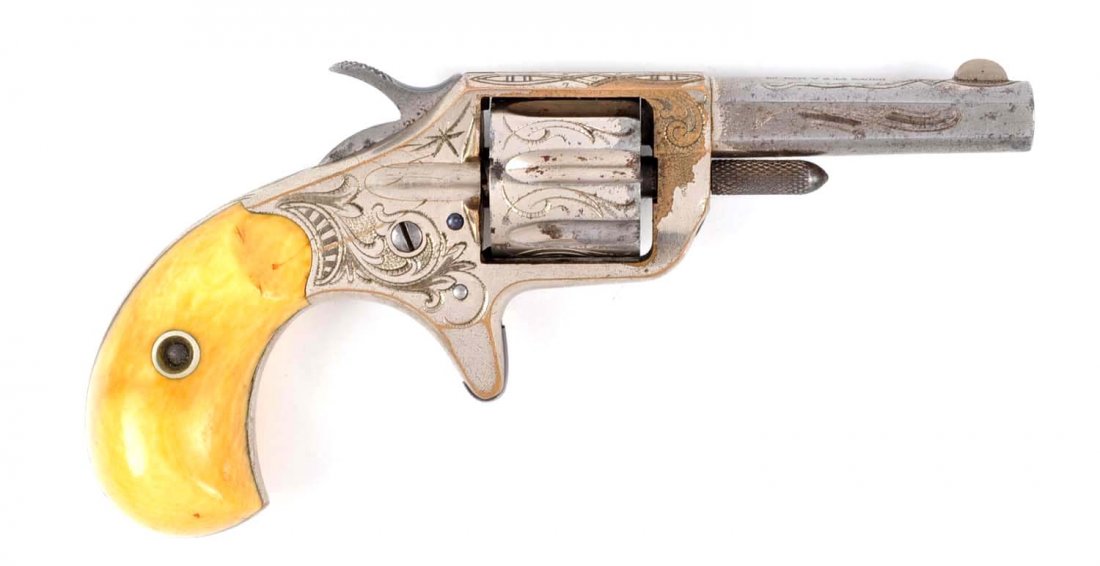 (A) Colt Factory Engraved New Line Revolver.: Manufacturer: Colt Model: Second Model Newline Serial No. 19365 Caliber: .22 rimfire Barrel Length: 2-1/4” FFL Status: Antique Manufactured 1876. Octagon barrel with an etched panel, seven shot, spu
