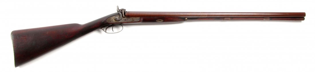 (A) Percussion Side-by-Side Shotgun by Ethan Allen.: Manufacturer: Ethan Allen Barrel Length: 28” FFL Status: Antique Round Damascus barrels with single white bead marked “Fine Stub Twist” on flat rib. Flat percussion lockplate, left side stamped