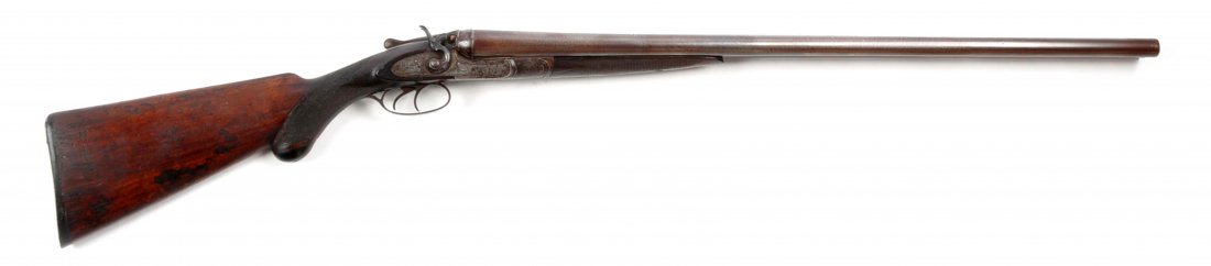 (A) SxS 10 Bore C.G. Bonehill English Hammer Gun.: Manufacturer: O.P. Bone Hill Model: SxS Serial No. 12333 Barrel Length: 30” Gauge: 12 Length of Pull: 14-1/4” Round Damascus steel brown barrels with solid rib and single silver bead; rib with dol