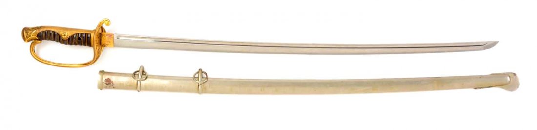 Japanese WWII Army Officer’s Kyo-Gunto Dress Sword.: Blade Length: 28-1/2” Slightly curved blade of forged steel with a single fuller. Typical gilt brass pierced hilt with relief daisies. Shark skin with double brass wire wrap. Nickel plated steel sca
