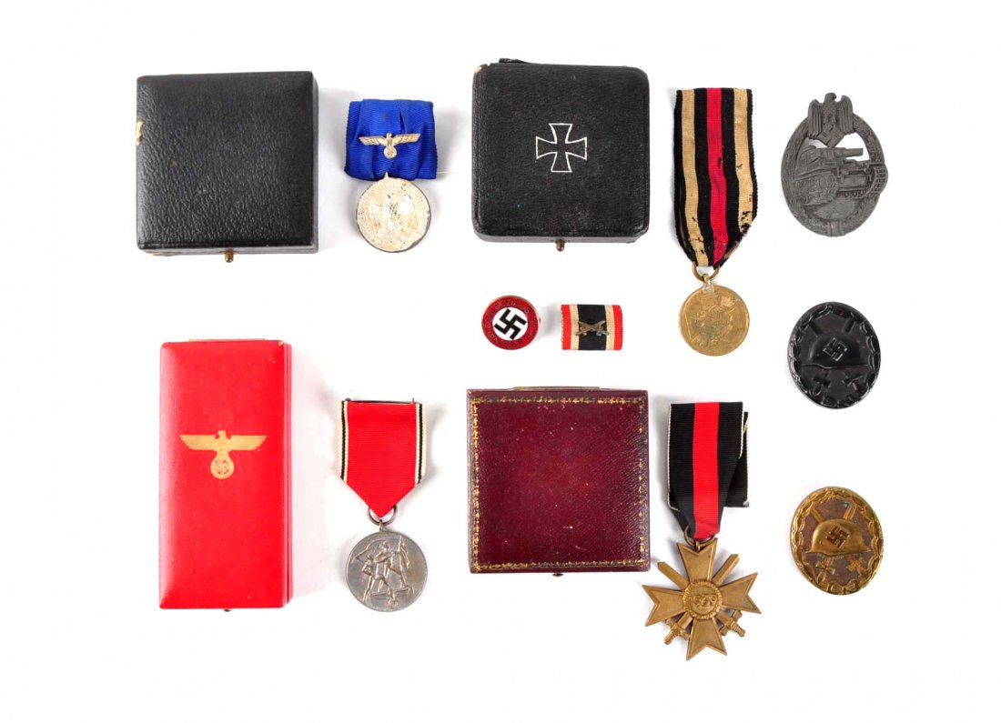 Lot Of 13: Various Third Reich Awards.: Largest: 4” L. Lot contains wound, Panzer assault, war merit, army service, and party badges as well as four original boxes.