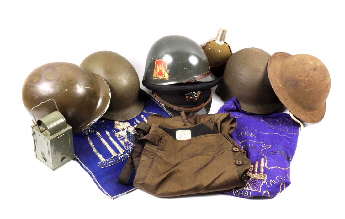 Lot Of 10: Militaria Items.: Lot includes; unissued WWII Japanese flight pants, Japanese canteen, three M1 helmets, M1917 helmet, USN visor cap, British lantern, and two souvenir Taj Mahal cloth pieces.