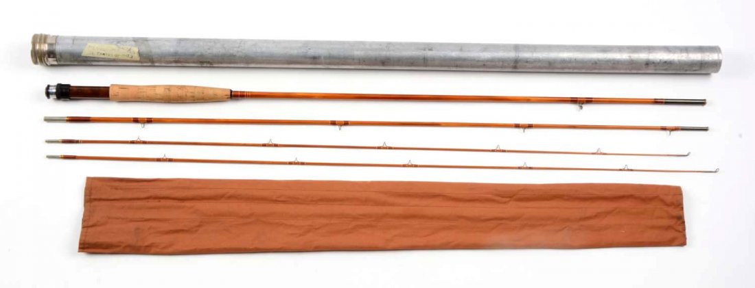 Edwards DeLuxe 9' Bamboo Fly Rod.: Three piece, two tip rod marked, “Edwards DeLuxe” has been over varnished. All wraps are in good condition. One tip has been repaired at the bottom of the section and is shortened by 1”. Comes w