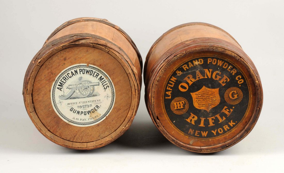 Lot of 2: Powder Kegs.: Leflin & Rand Powder Co. “Orange Rifle” Powder wood keg 13”x 10”, all bindings secure, nice clean label. The second, American Powder Mills 15”x 10-1/2”, label may not be original. (Very Go