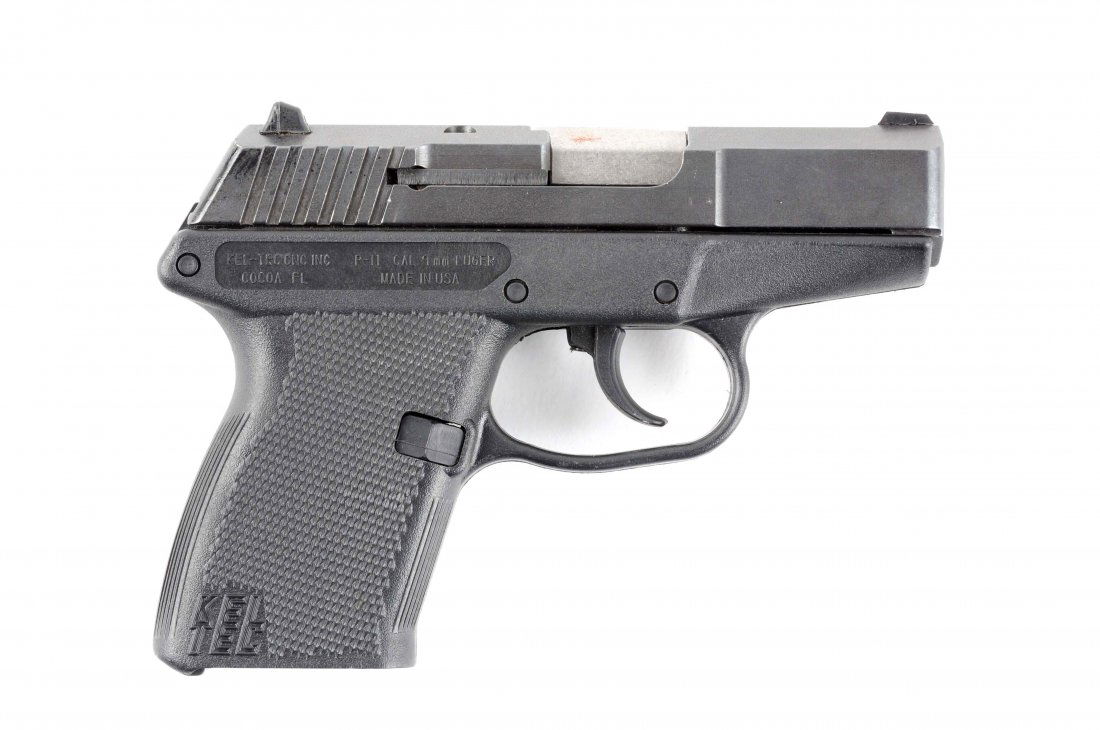 (M) Keltec P-11 Semi Automatic Pistol In Case.: Manufacturer: Keltec Model: P-11 Serial No. AG602 Caliber: 9mm Barrel Length: 3” FFL Status: Modern Blued hammerless slide, stainless steel barrel, black polymer frame with checkered panels on each