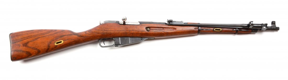 (C) Polish M-44 Carbine Bolt Action Rifle in Box.: Manufacturer: Polish Model: M-44 Serial No. BD07568 Caliber: 7.62x54 Barrel Length: 21 - 1/2” FFL Status: Curio & Relic Round blued barrel with hooded front sight and cross section blued bayonet mou