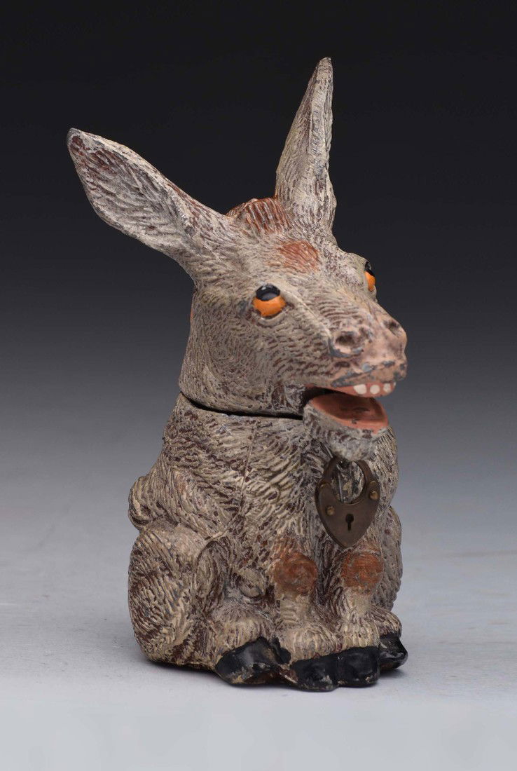 Spelter Donkey Spring Jaw Mechanical Bank.: Retains original trick lock. (JY). (Near Mint). 5" T.