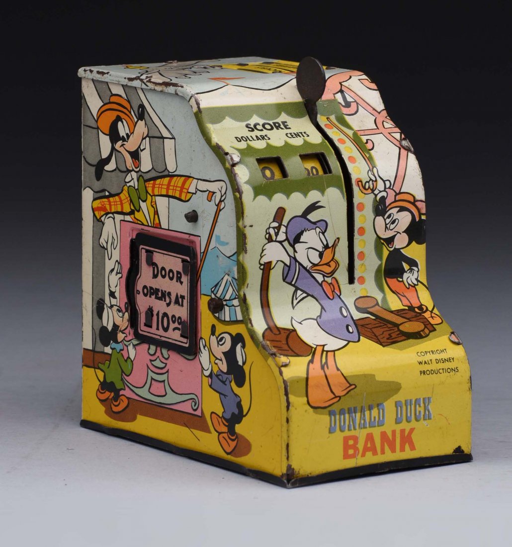 Tin Donald Duck Registering Bank. (1 of 2)