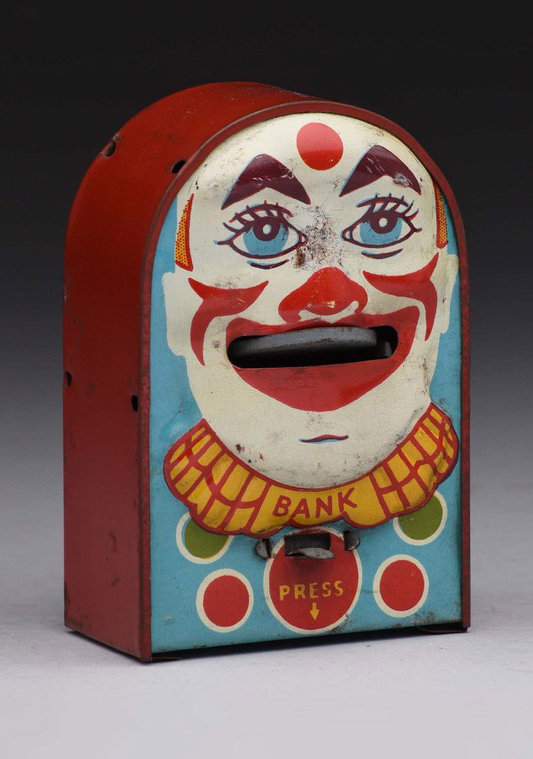 Tin Clown Face Mechanical Bank. (1 of 2)