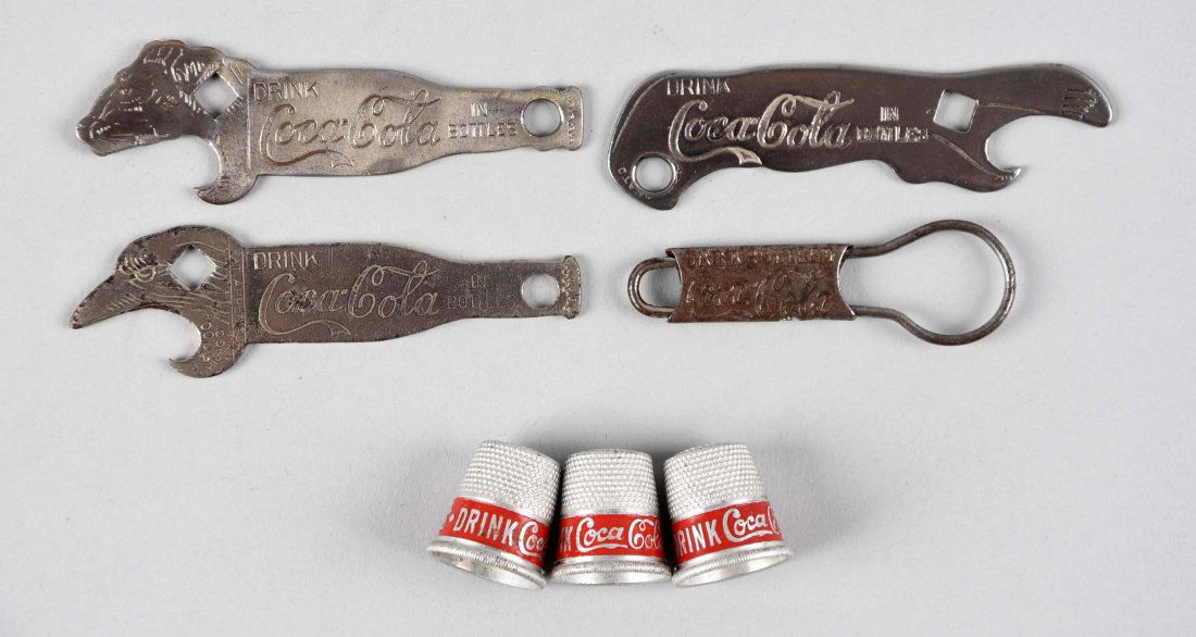 Assorted Early Coca - Cola Bottle Openers & Thimbles. (1 of 1)