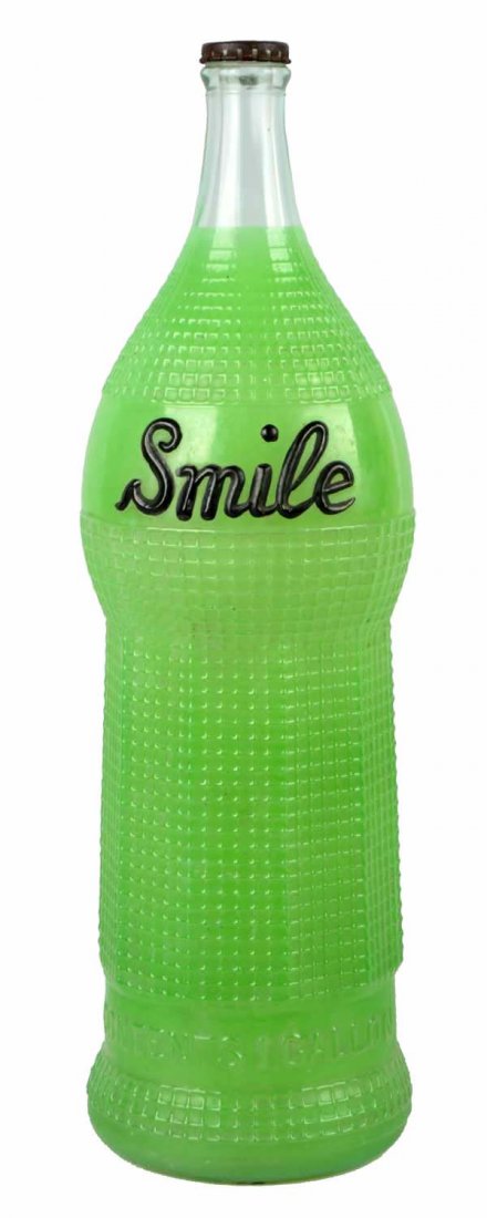 Large Glass Smile Soda Advertising Bottle. (1 of 6)