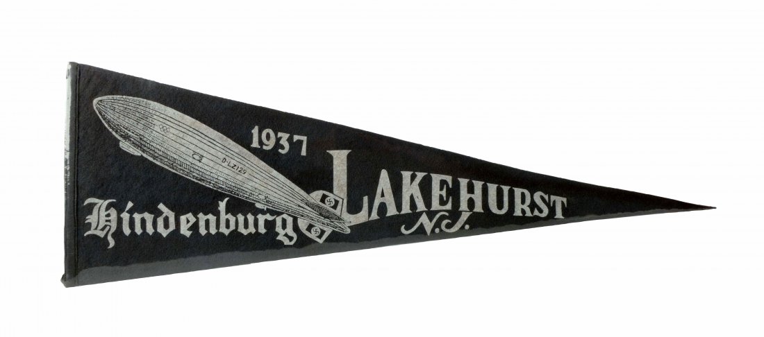 1937 Hindenburg Advertising Pennant.: The pennant is shrunk wrapped onto a piece of foam board. There is a note on the back the reads "This pennant was purchased in Atlantic City right after the Hindenburg crashed". The pennant is in very