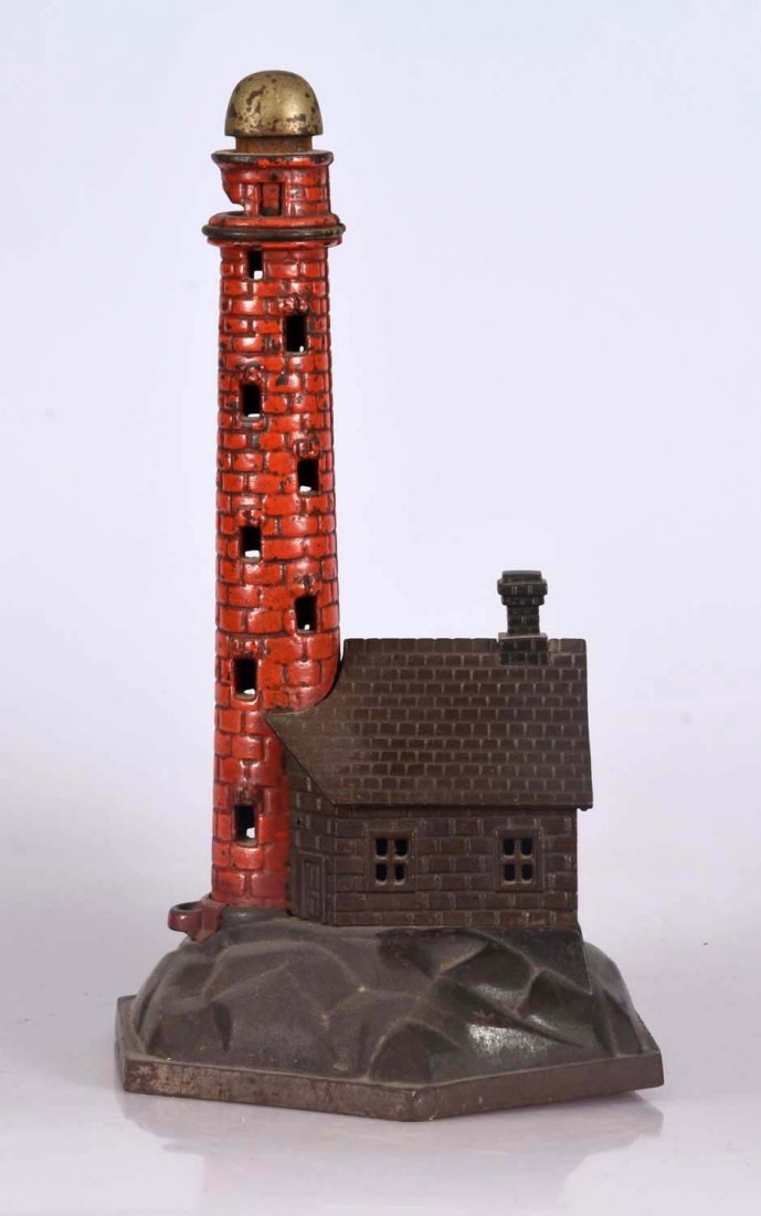 Lighthouse Cast Iron Bank. (1 of 2)