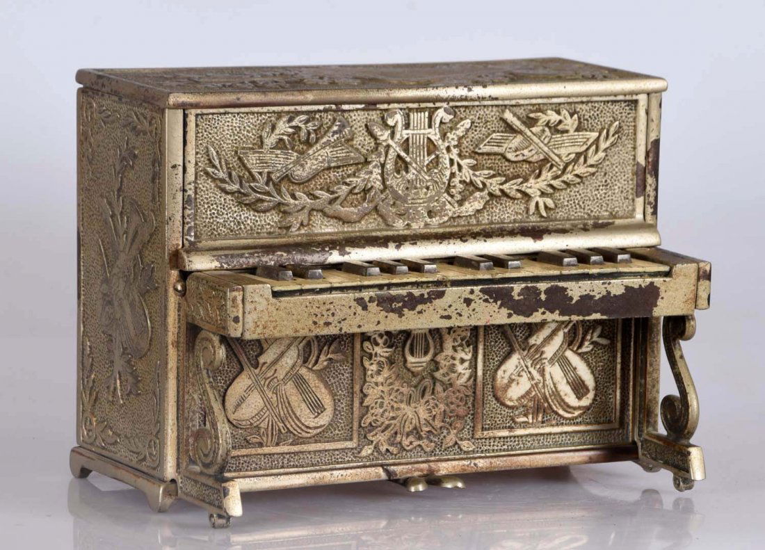 E. M. Roche Novelty Co. Cast Iron Piano Bank. (1 of 2)