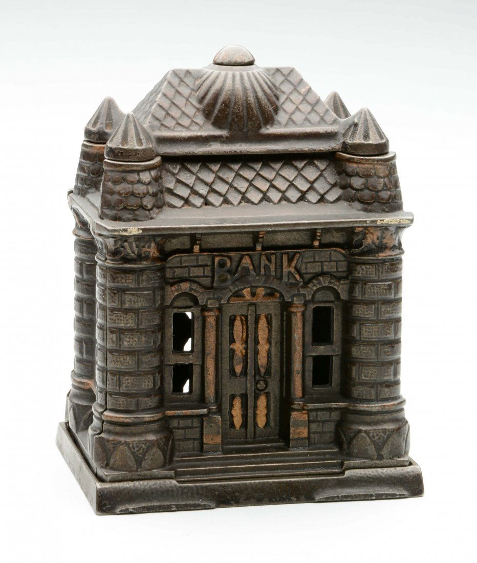 Cast Iron Four Tower Still Bank. (1 of 3)
