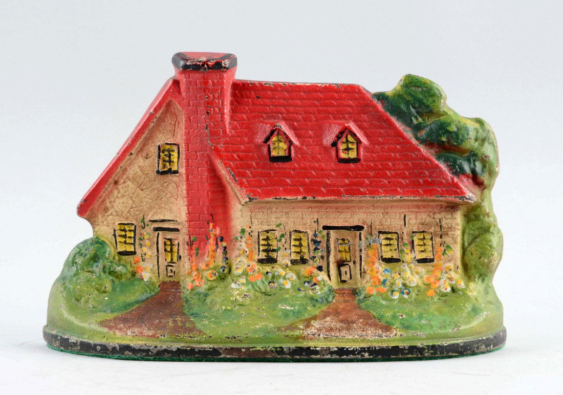 Cast Iron Cape Cod Cottage Doorstop. (1 of 2)
