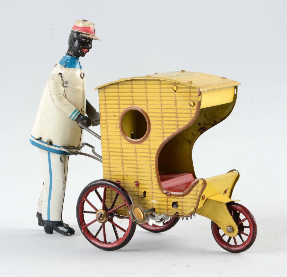 Strauss Tin Litho Wind-Up Rollo Chair Toy. (1 of 2)