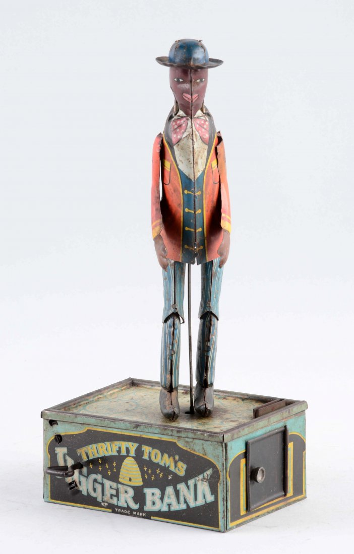 Strauss Tin Litho Wind-Up Thrifty Tom Jigger Bank. (1 of 2)