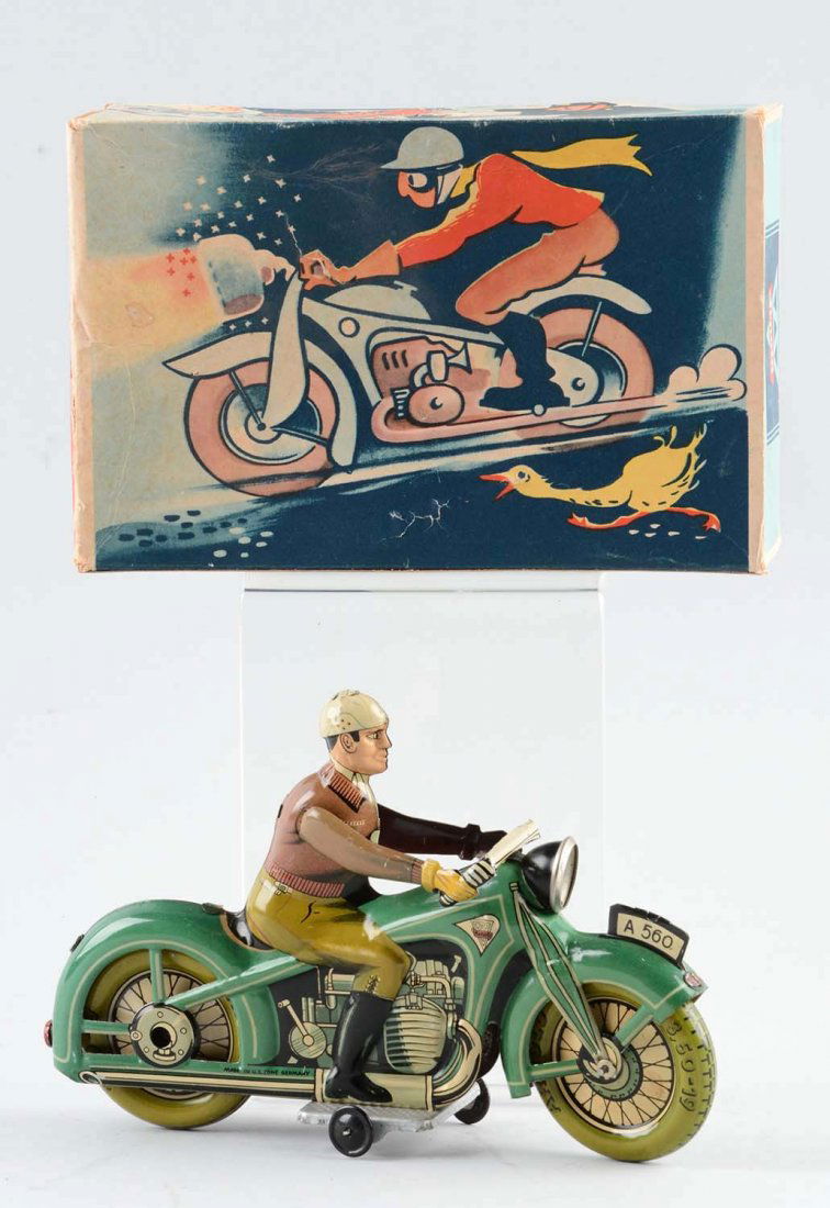 German Arnold Tin Litho Wind Up Motorcycle Toy. (1 of 2)