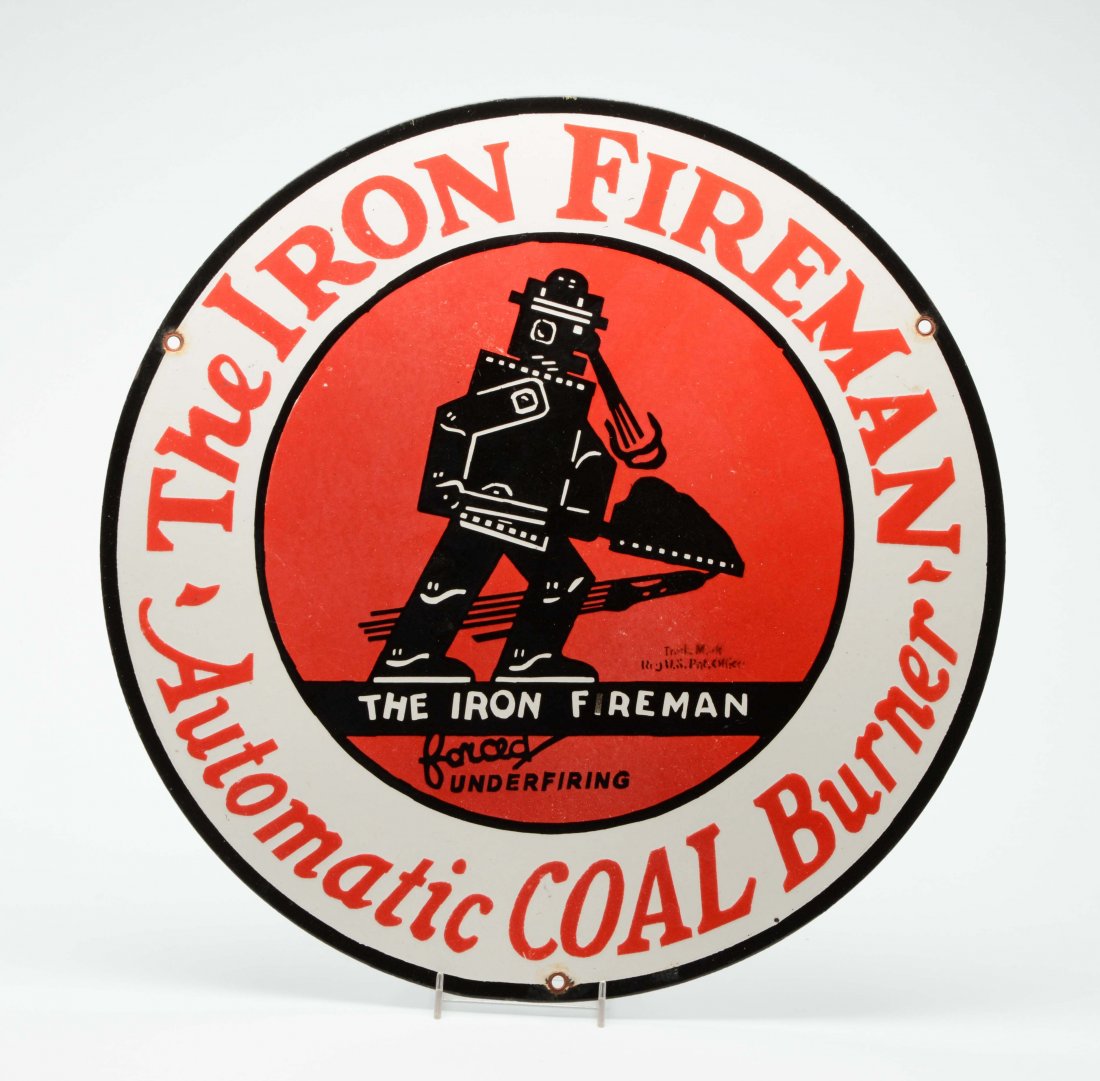 Interesting Iron Fireman Robot Porcelain Sign.: Unknown age but probably more contemporary. Has an excellent look of a fireman depicted as a robot shoveling coal. Sign reads "The Iron Fireman - Automatic Coal Burner". Some oxidation in ringlets. (N