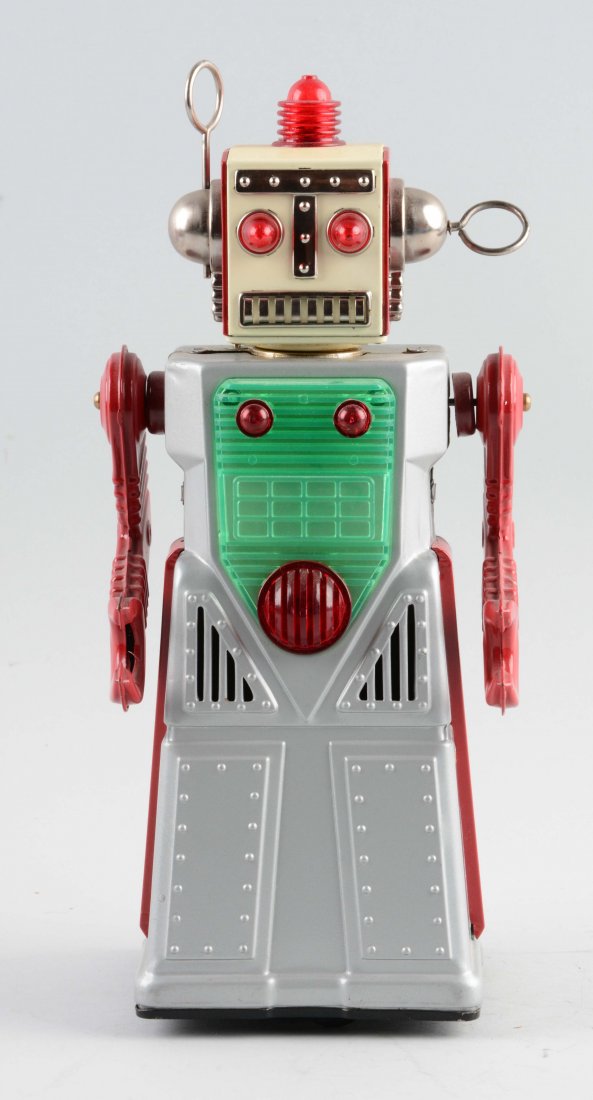 Japanese Tin Litho Battery-Operated Radical Robot.: Medium-sized skirt robot. Looks to be all original. Clean battery case. Chrome is nice. (Excellent). 12'' T.