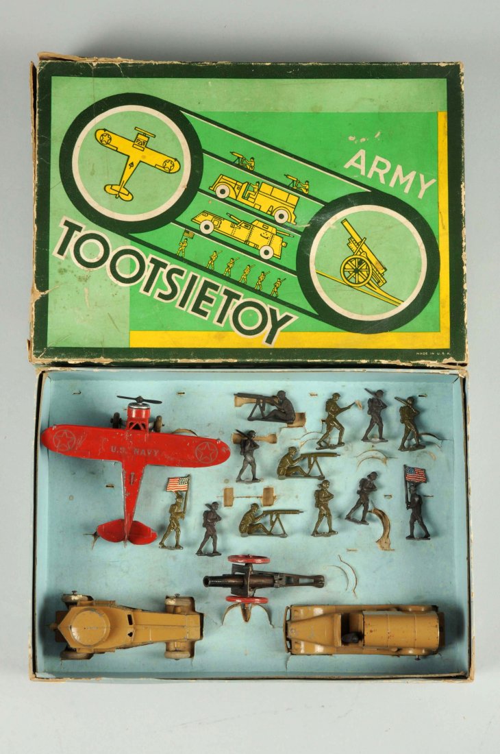 Tootsietoy No. 650 Army Set.: Set includes: Waco Bi-plane, scratches and paint chips, in very good condition. White Half Track, missing the rear gun, white rubber tires show wear, in good condition. Army Truck, two tires replaced,