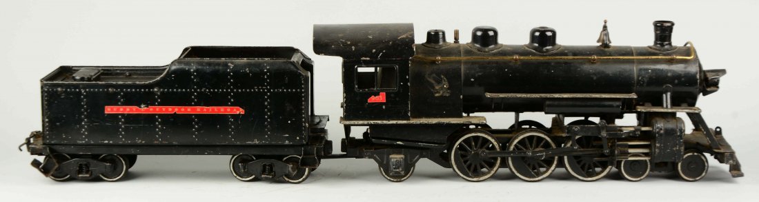 Pressed Steel Buddy L Steam Locomotive & Tender.: The locomotive is missing the Buddy L insignia from the boiler front, scratches and paint chips throughout, overall in very good condition. The tender has some loss to the stickers on the sides, missi