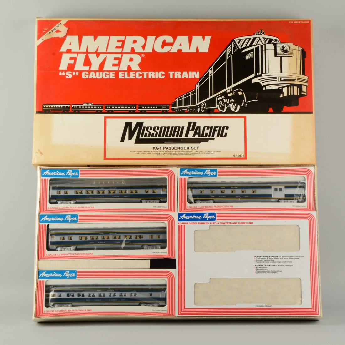 American Flyer No. 49601 Missouri Pacific Passenger: Includes: Alco AA Units, Combo Car, Pullman Car, Observation Car and Vista Dome Car. Mint in the original sealed box. Set box lid has some yellowing around the edges and a scrape in the upper left cor