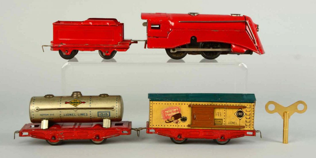 Lionel No. 1545 Wind Up Freight Set.: Set includes: Red Steam Locomotive, scratches and paint chips, in very good to excellent condition. Tender, paint loss on frame, in excellent condition. No. 1515 Sunoco Tank Car, scratches and paint c