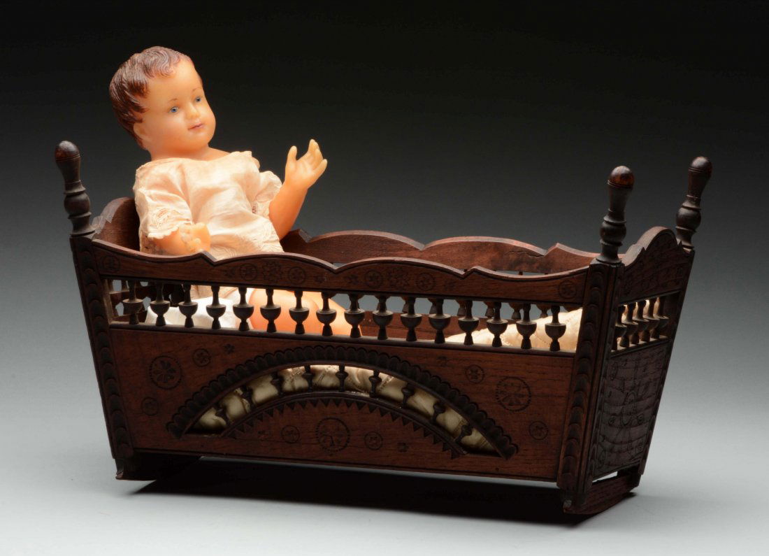 All Wax Child In Elaborately Styled Wooden Cradle. (1 of 2)