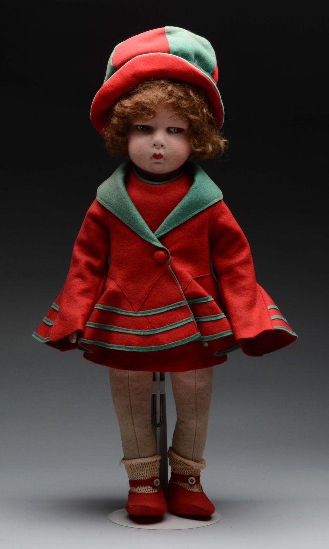 French Cloth Magli Doll.: Felt cloth art doll of excellent quality with swivel neck, jointed shoulders and hips, very detailed eye painting with highlights, closed mouth with lip shading, original mohair wig; all factory origi